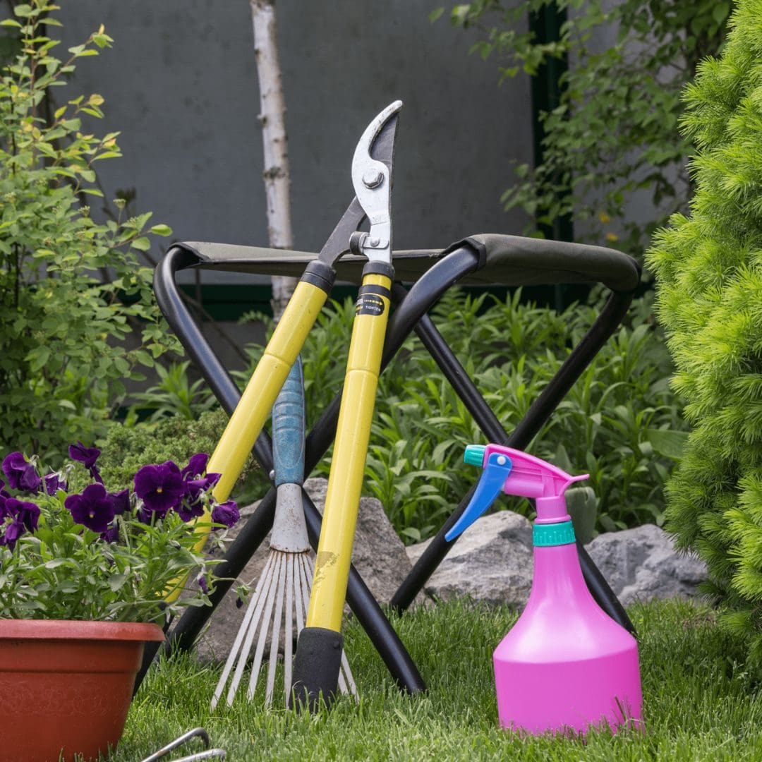 twig cutter, pink watering can, brown pot